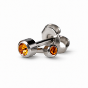 Caflon Mini Topaz 3mm stud earrings with orange stone, stainless steel